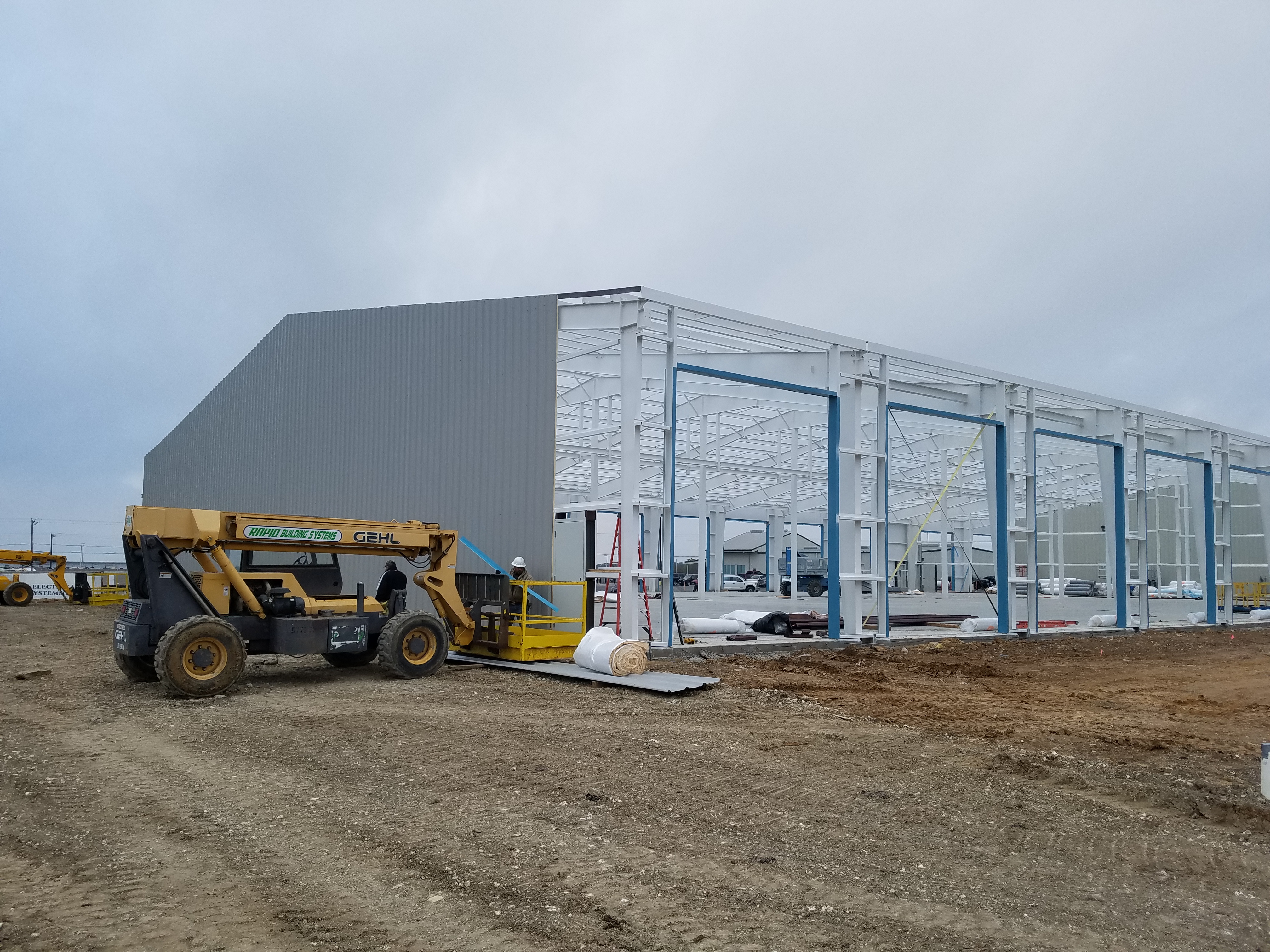 RV facility steel frame and metal siding under construction in Alvarado, Texas